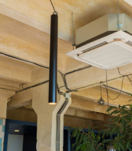 modern glass and metal loft lamps in a design office