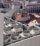 Industrial air conditioning and ventilation systems on the roof of a building on a sunny day.